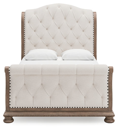 Ardenfield  Upholstered Sleigh Bed With Mirrored Dresser And Nightstand